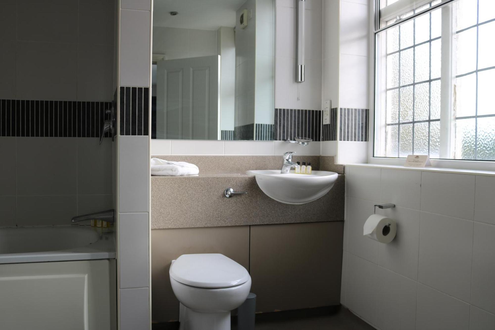 Fairway Inn Manchester Bagian luar foto