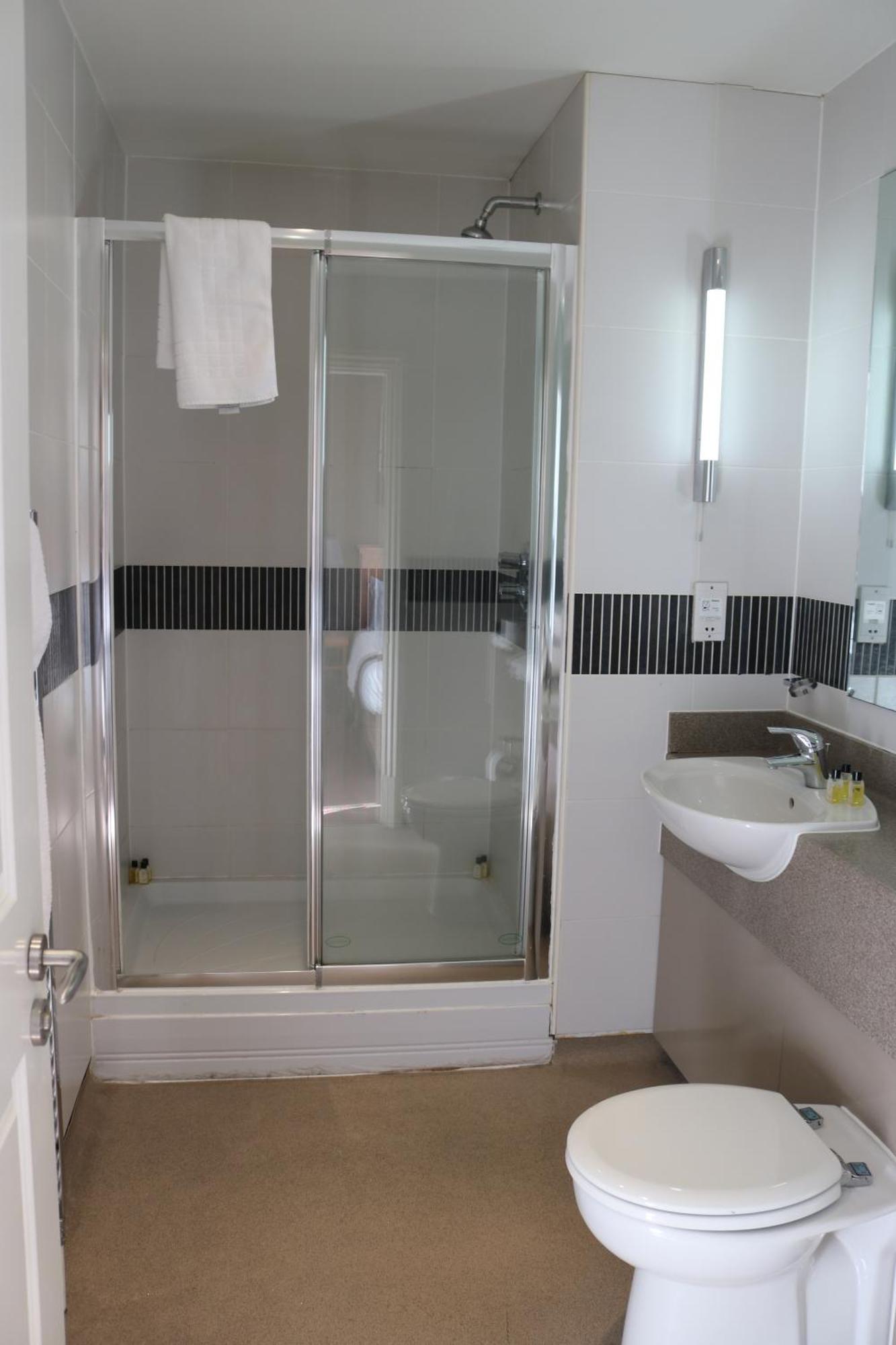 Fairway Inn Manchester Bagian luar foto