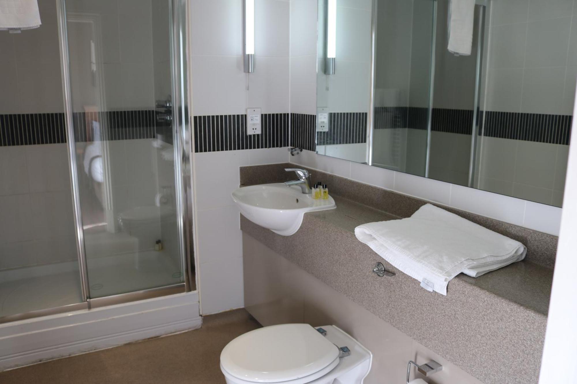 Fairway Inn Manchester Bagian luar foto